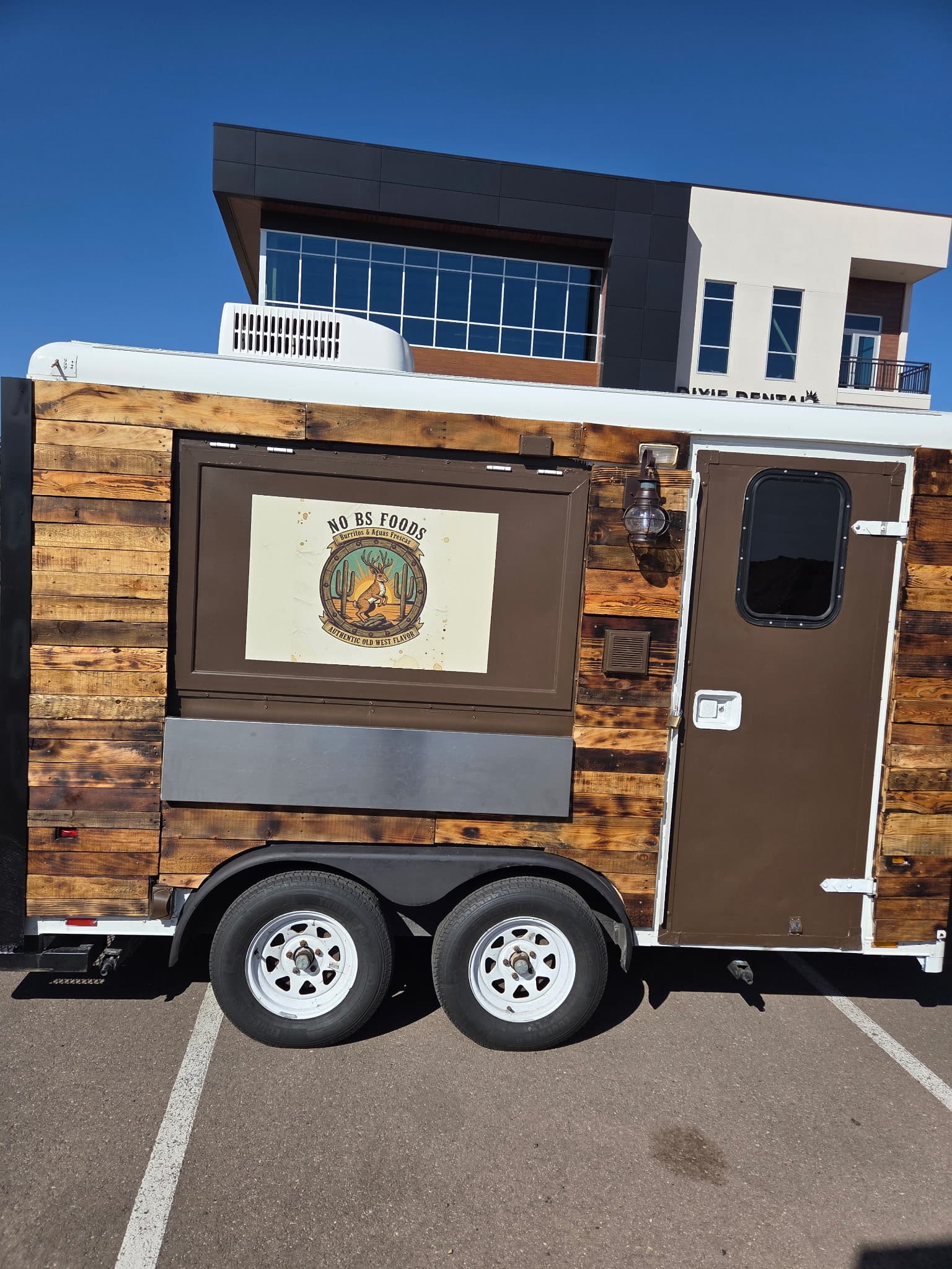 No BS Foods truck, logo side, parked in a lot